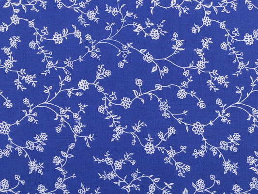 Attēls ar 100% Kokvilnas audums - baltas ziedošas stīgas uz karaliski zila 125 g/m² – pieejams Šarlotes audumi