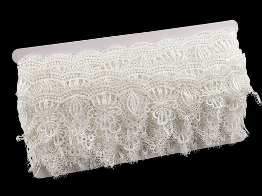 Image de dentelle guipure décorative 65 mm blanche – disponible en ligne chez Šarlotes audumi
