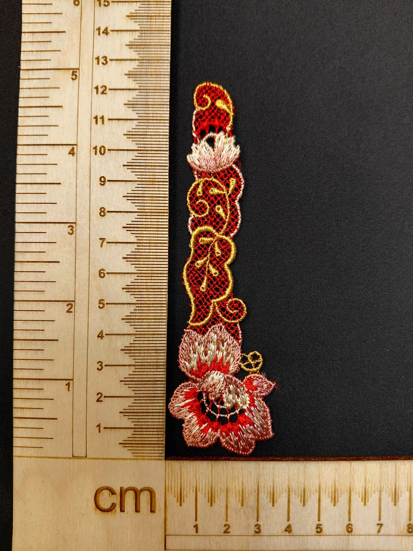 Image of patch/applique 12.5 x 3.5 cm – available at Šarlotes audumi