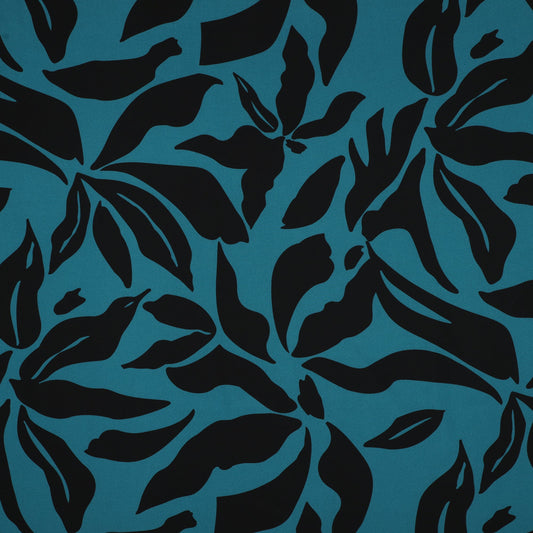 Attēls ar Kleitu audums ar elastānu - raibs raksts uz petrol fona 80 g/m² – pieejams Šarlotes audumi