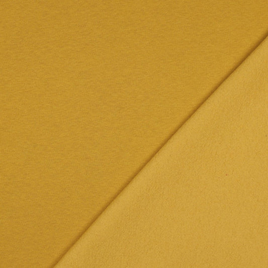 Kokvilnas siltināta trikotāža - sinepju 285 g/m²