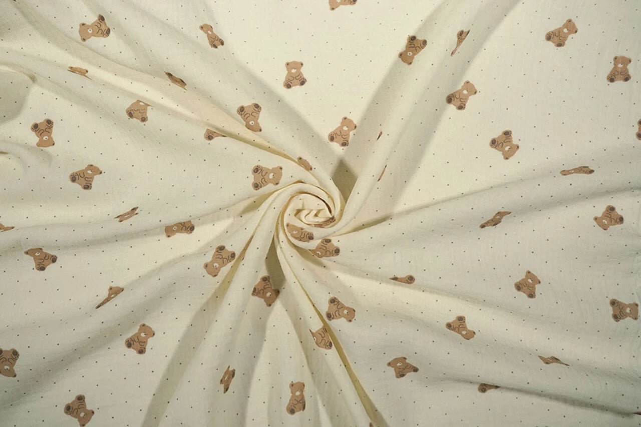 Muslīns - lācīši uz sviesta dzeltena fona 125 g/m²