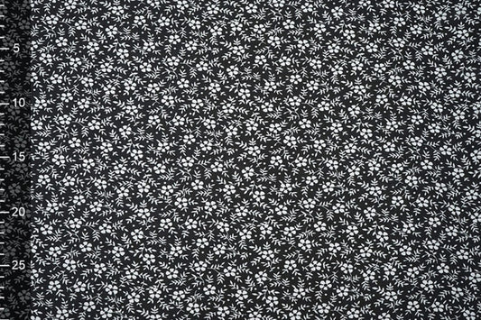 Šifons - balti ziediņu uz melna fona | 150 cm | 65 g/m²