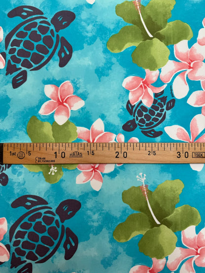 Tissu français à motif floral tropical dans des tons bleu-vert – 160 g/m²