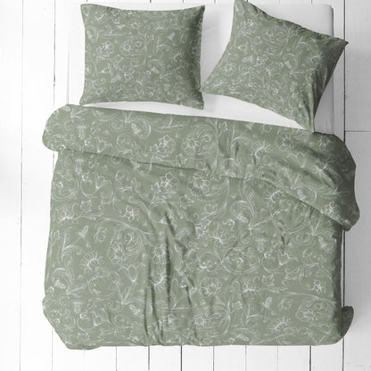 Image en tissu 100 % coton - ombres de fleurs blanches sur fond vert 125 g/m² – disponible chez les tissus Charlotte