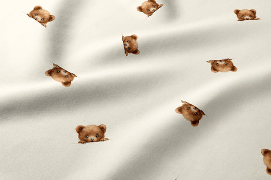 Attēls ar 100% Kokvilnas audums - lācēns uz bēša fona 125 g/m – pieejams Šarlotes audumi