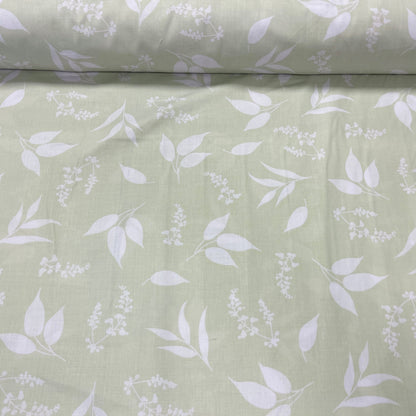 100 % tissu en coton - motif de feuilles sur fond vert tendre 125 g/m²