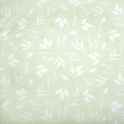 100% coton - motif de feuilles sur fond vert pâle 125 g/m²