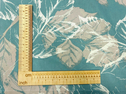 Tissu 100 % coton, motif de feuilles sur fond turquoise, 220 cm, 146 g/m²