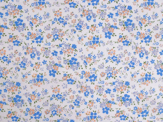 100% Baumwollstoff mit blauen feinen Blümchen – online erhältlich bei Šarlotes audumi