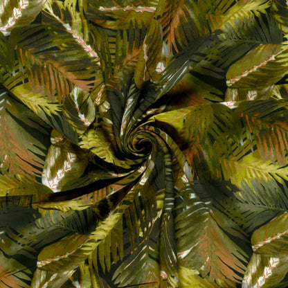 Visuel avec tissu 100 % viscose - feuilles tropicales vertes 125 g/m² – disponible chez Šarlotes audumi