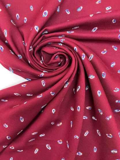 Tissu sergé italien couleur bordeaux à motif fin 125 g/m²