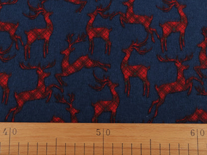 Weihnachts-Baumwollflanell mit Rentieren auf Blau