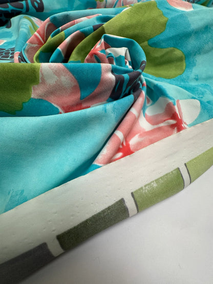 Tissu français à motif floral tropical dans des tons bleu-vert – 160 g/m²