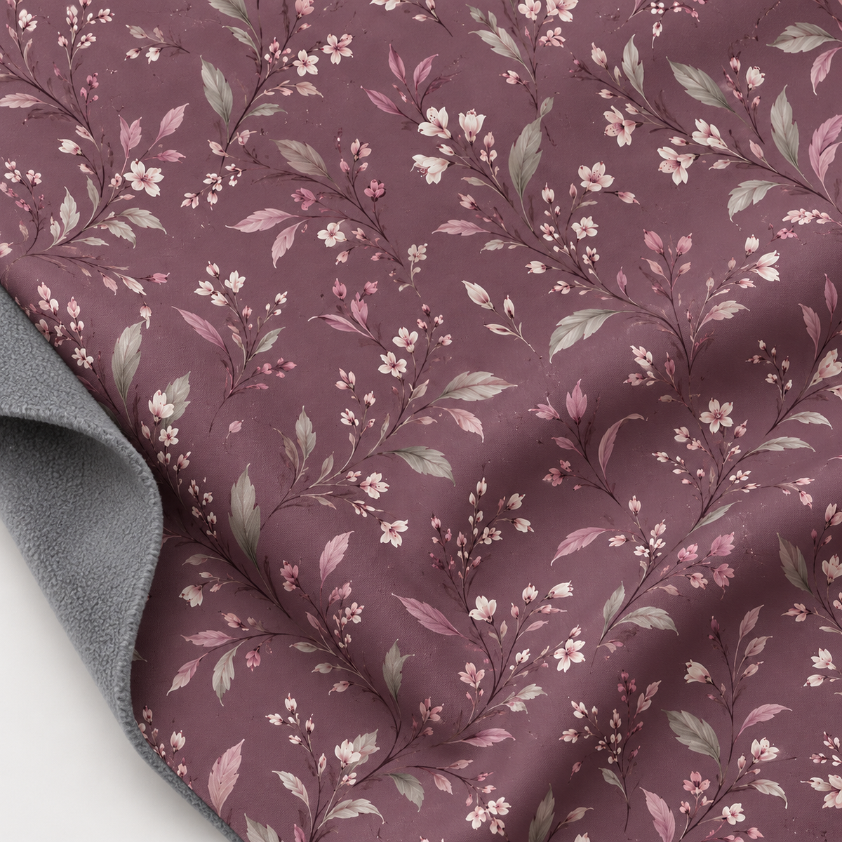 Softshell-Stoff mit Blumenmuster auf Altrosa-Hintergrund