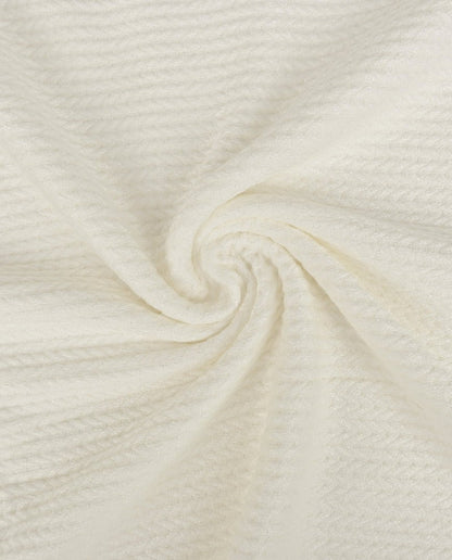 Image de tissu jacquard tricoté à torsades - blanc chaud 350 g/m² – disponible chez Šarlotes audumi