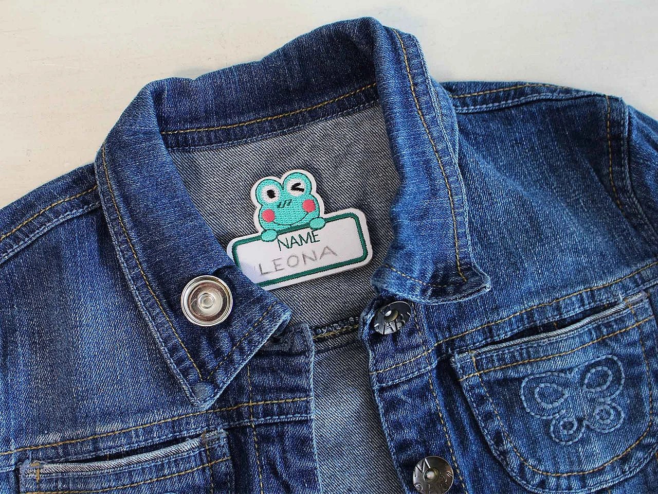 Attēls ar Auduma etiķete ar vārda vietu – uzlīmējama – pieejams Šarlotes audumi