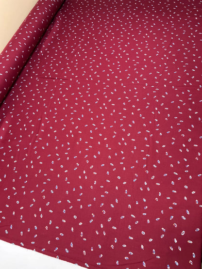 Tissu sergé italien couleur bordeaux à motif fin 125 g/m²