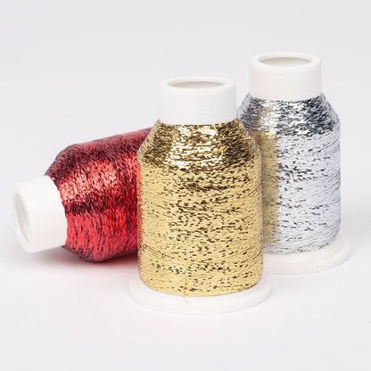 Image avec le fil à effets DROPS Glitter au brillant métallique – 10g / 700m – disponible chez Šarlotes audumi