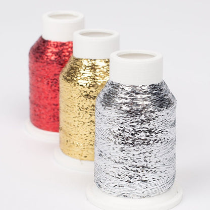 Image avec fil à effet DROPS Glitter avec brillance métallique – 10g / 700m – disponible chez Šarlotes audumi