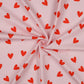 Attēls ar Flanelis - sarkanas sirsniņas uz rozā 165 g/m² – pieejams Šarlotes audumi