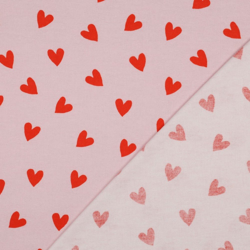 Attēls ar Flanelis - sarkanas sirsniņas uz rozā 165 g/m² – pieejams Šarlotes audumi