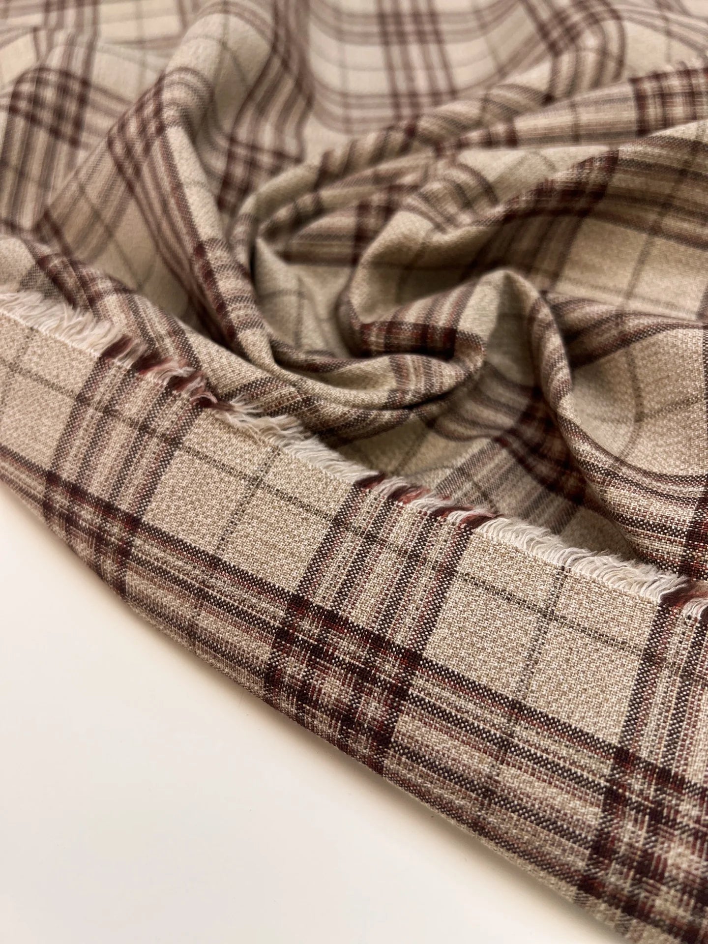 Image of Italian cotton and linen fabric in a checked pattern in beige tones – available online at Charlotte's Fabrics