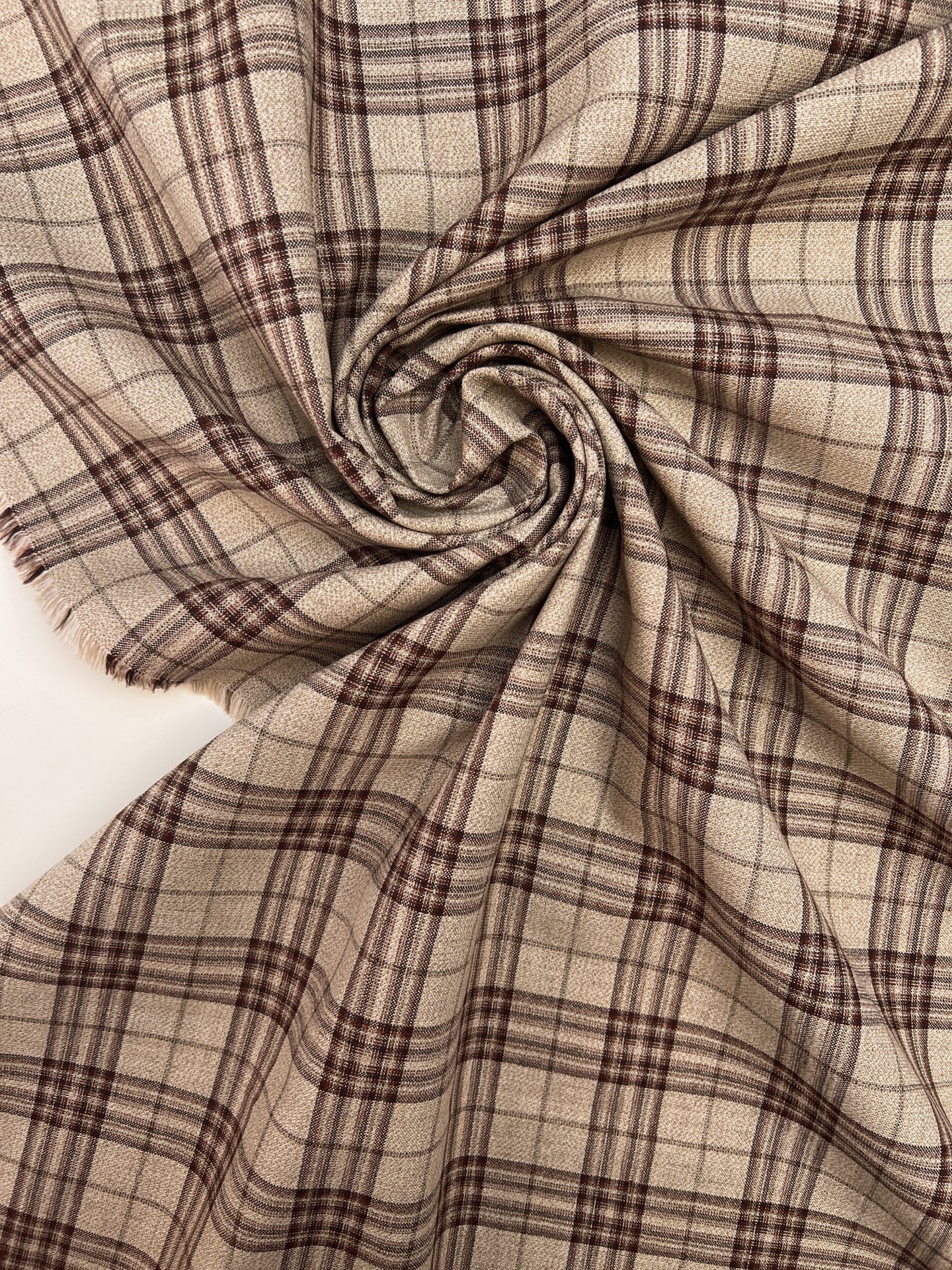 Image of Italian cotton and linen fabric in a beige checked pattern – available online at Šarlotes audumi