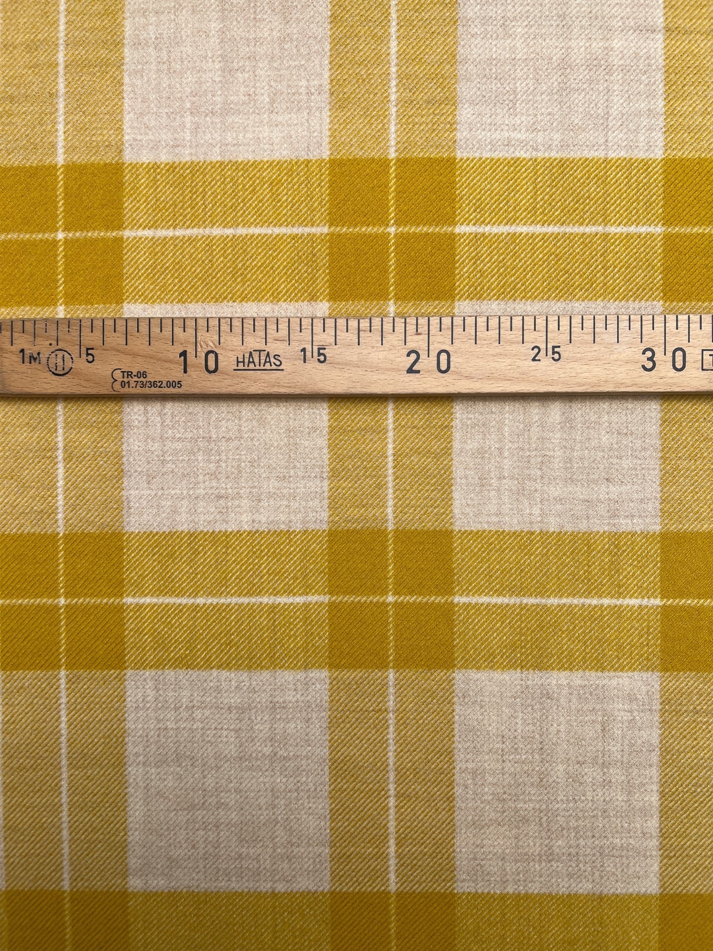 Italian wool and alpaca fabric in a plaid pattern in mustard yellow tones – available online at Šarlotes audumi