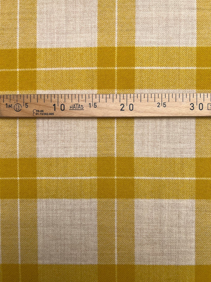 Italian wool and alpaca fabric in a plaid pattern in mustard yellow tones – available online at Šarlotes audumi