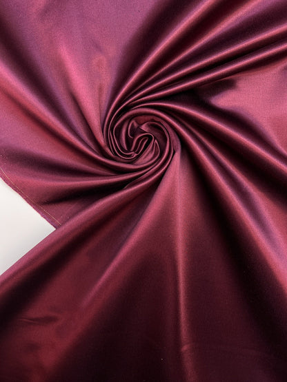 Image of Italian silk and cotton satin fabric in a dark purple shade – available online at Charlotte's Fabrics