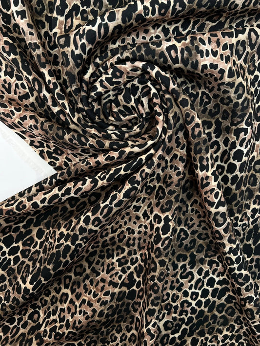 Attēls ar Itāļu audums ar leopardrakstu | Poliesters 98% Elastāns 2% | 145 cm – pieejams Šarlotes audumi