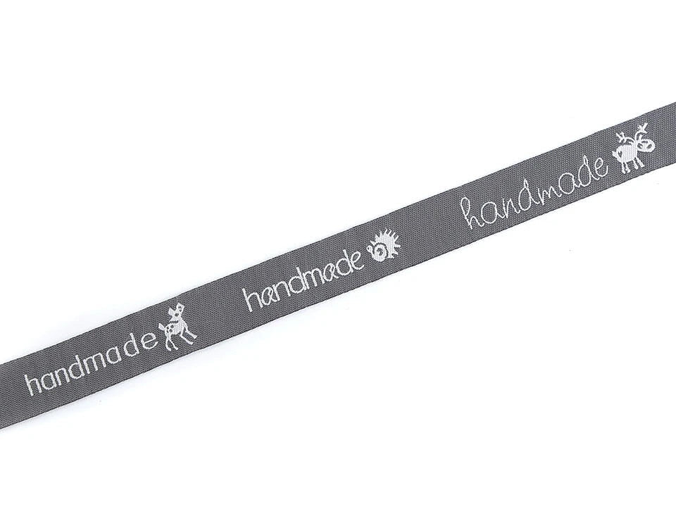 Attēls ar Kokvilnas lente ar uzrakstu Hand made | 16 mm, 9 m – pieejams Šarlotes audumi