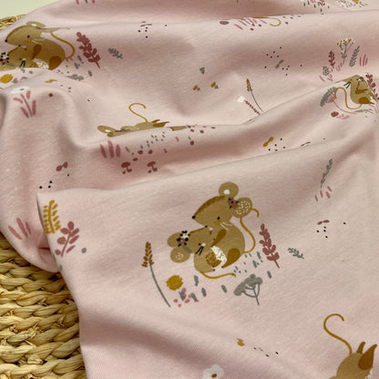 Jersey de coton à motif de petites souris sur fond rose pâle 220 g/m²