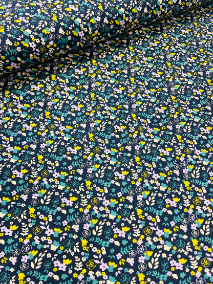 Jersey en coton - fines petites fleurs sur fond bleu foncé 220 g/m² (cert. GOTS)