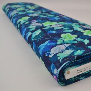 Image de lin avec coton - feuilles sur fond bleu 170 g/m² – disponible chez Tissus Charlotte