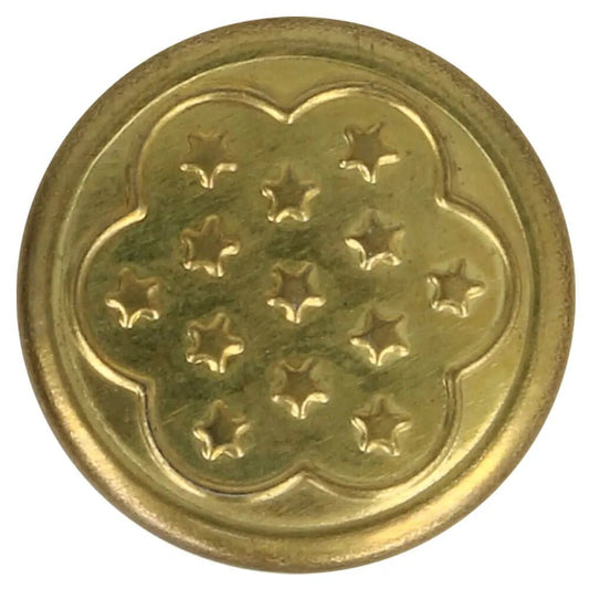 Image avec bouton en métal pour jean 17 mm doré avec fleur – disponible en ligne chez Šarlotes audumi