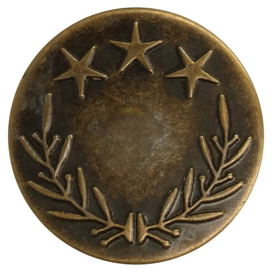 Image d’un bouton de jean en métal 25 mm antique avec étoiles – disponible en ligne chez Šarlotes audumi