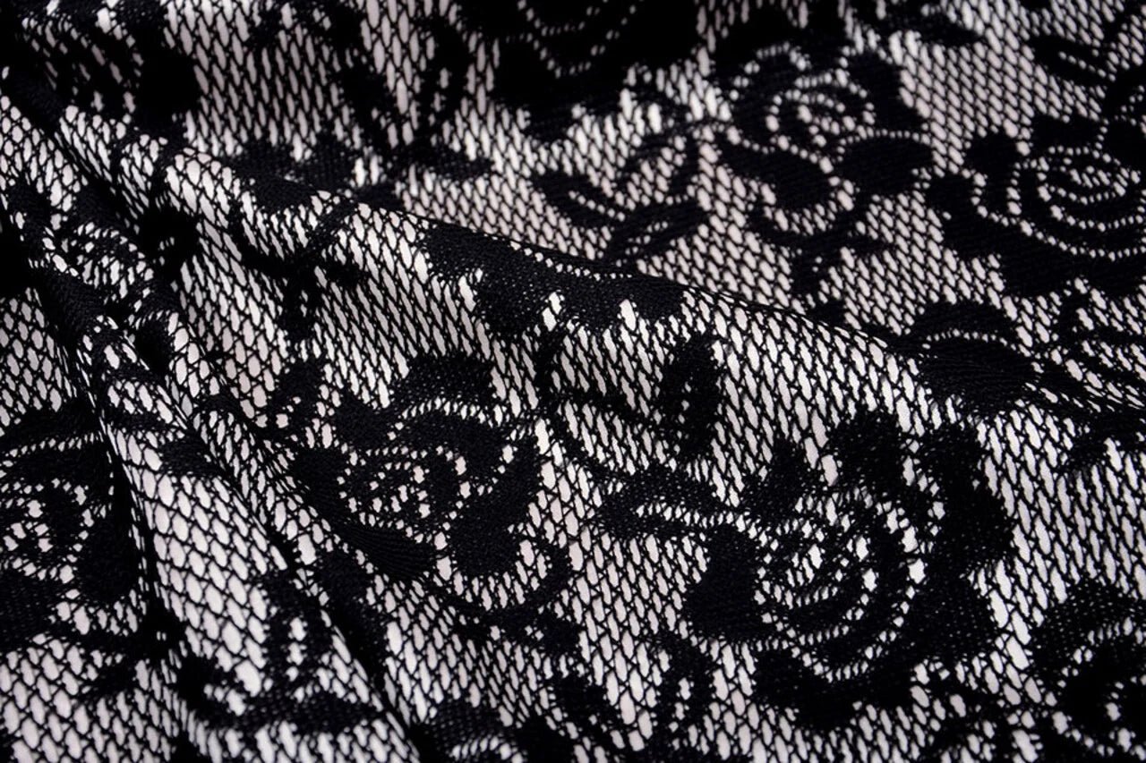 Attēls ar Mežģīņu audums - melns ar balta satīna oderi 155 g/m² – pieejams Šarlotes audumi