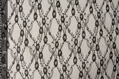 Tissu en dentelle délicat - noir 50 g/m²