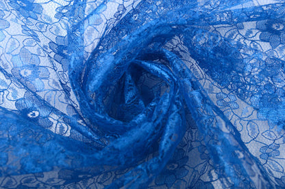 Tissu en dentelle fin - fleurs de bleuet 75 g/m²