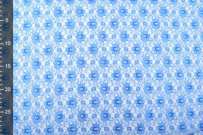 Tissu dentelle fin - fleurs de bleuet 75 g/m²