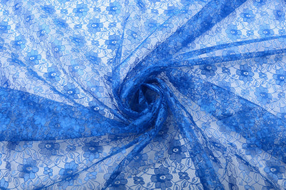 Tissu dentelle fin - fleurs de bleuet 75 g/m²