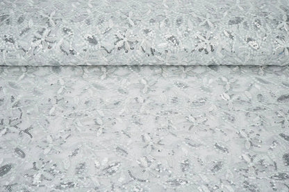 Image avec Tissu en dentelle|Tulle brodé avec paillettes 160 g/m² - argenté – disponible chez Šarlotes audumi
