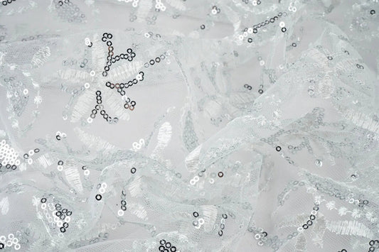 Attēls ar Mežģīņu audums|Izšūts tills ar fliteriem 160 g/m² - sudraba – pieejams Šarlotes audumi