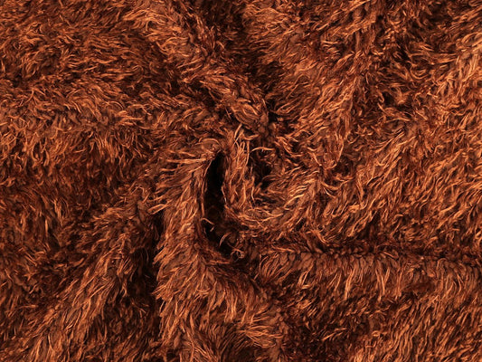Bild mit weichem Plüsch-Fellstoff in Orangebraun – 1 m Packung – online erhältlich bei Charlottes Stoffe