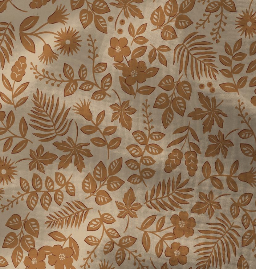 Attēls ar Muslīns - brūni ziedi uz bēša fona 130 g/m² – pieejams Šarlotes audumi