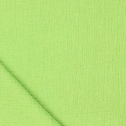 Image with Muslin - bright green 125 g/m² – available at Charlotte's fabrics