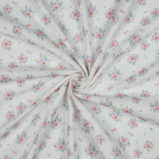 Attēls ar Muslīns - puķītes un bantes 120 g/m² – pieejams Šarlotes audumi