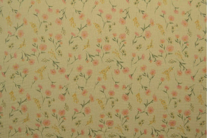 Mousseline - fleurs délicates sur fond beige 140 g/m²